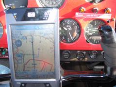Notice the 34mph tailwind indicated in the circle, and the wind barbs.  The total ground speed in the top right of the screens shows 223mph. Astute observers will find 2 pieces of evidence that I could not be cruising in level flight at 8430 feet. (Ignoring the 8265 on the PDA for a moment) Screen - 223mph.JPG